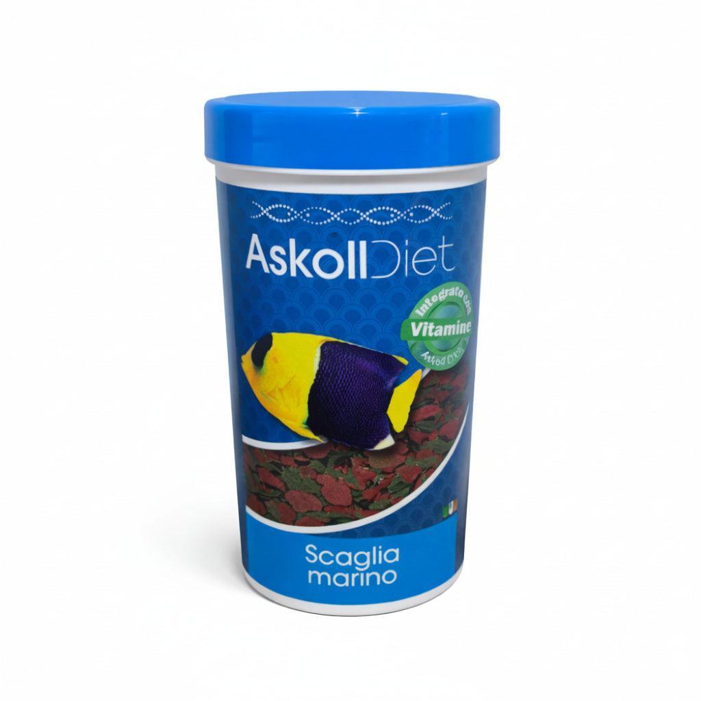 A cylindrical container of Askoll Diet Scaglia Marino fish food, featuring a blue lid and a blue label with a yellow and purple butterfly fish illustration, set against a plain white background.