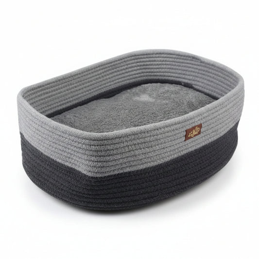 A gray and black rope pet bed with a soft gray cushion inside, shown with dimension lines and measurements indicating 30cm by 42cm by 14cm.