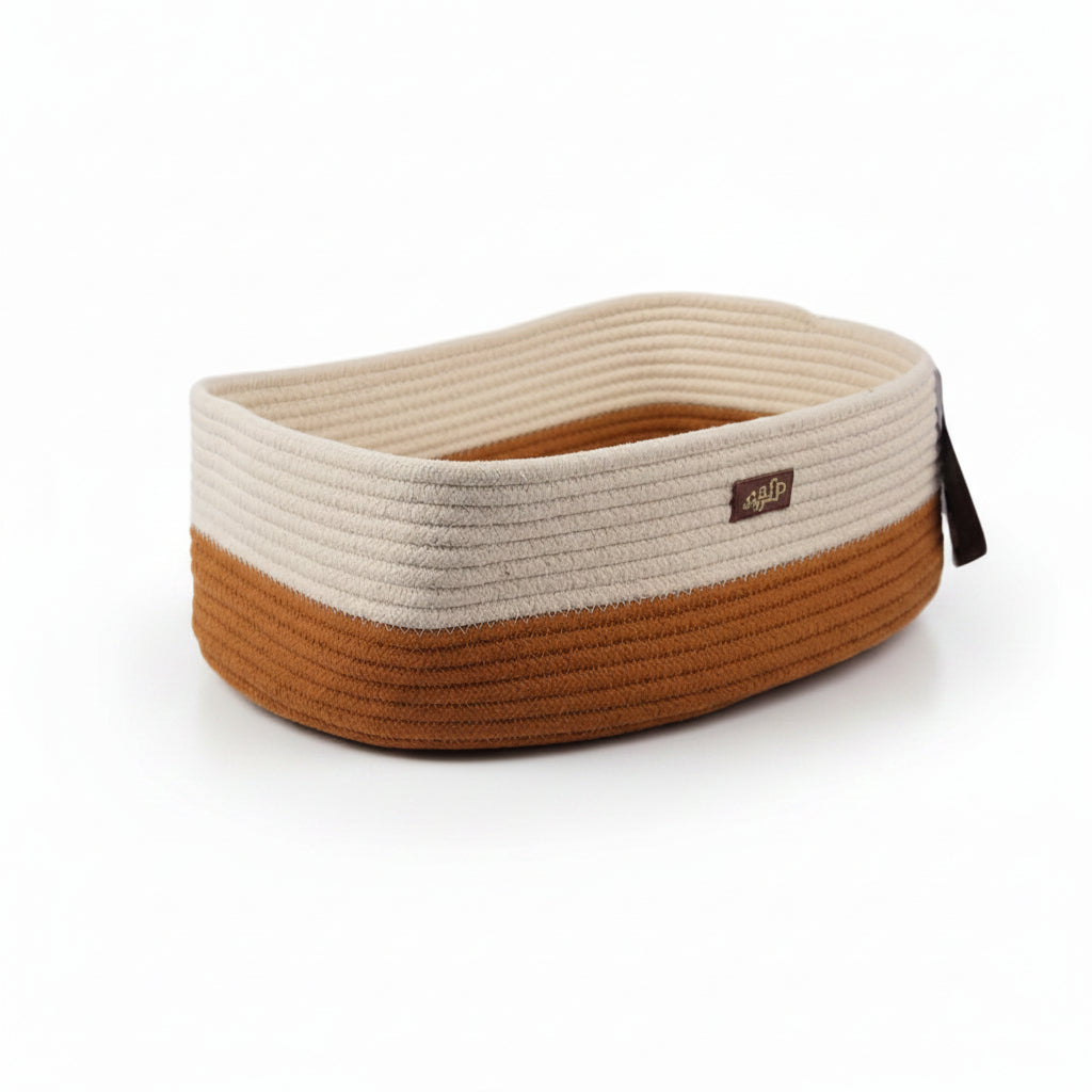 A rope-style pet bed with a cream top half and a brown bottom half, shown with dimension lines and measurements indicating 14cm/5.5 inches height, 30cm/11.