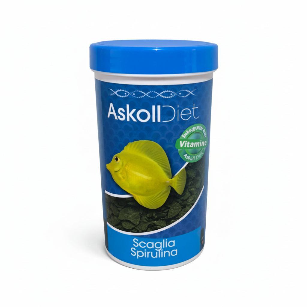 A cylindrical container of Askoll Diet Spirulina fish food, featuring a bright blue lid and a blue label with a yellow fish illustration and green Spirulina leaf graphics.