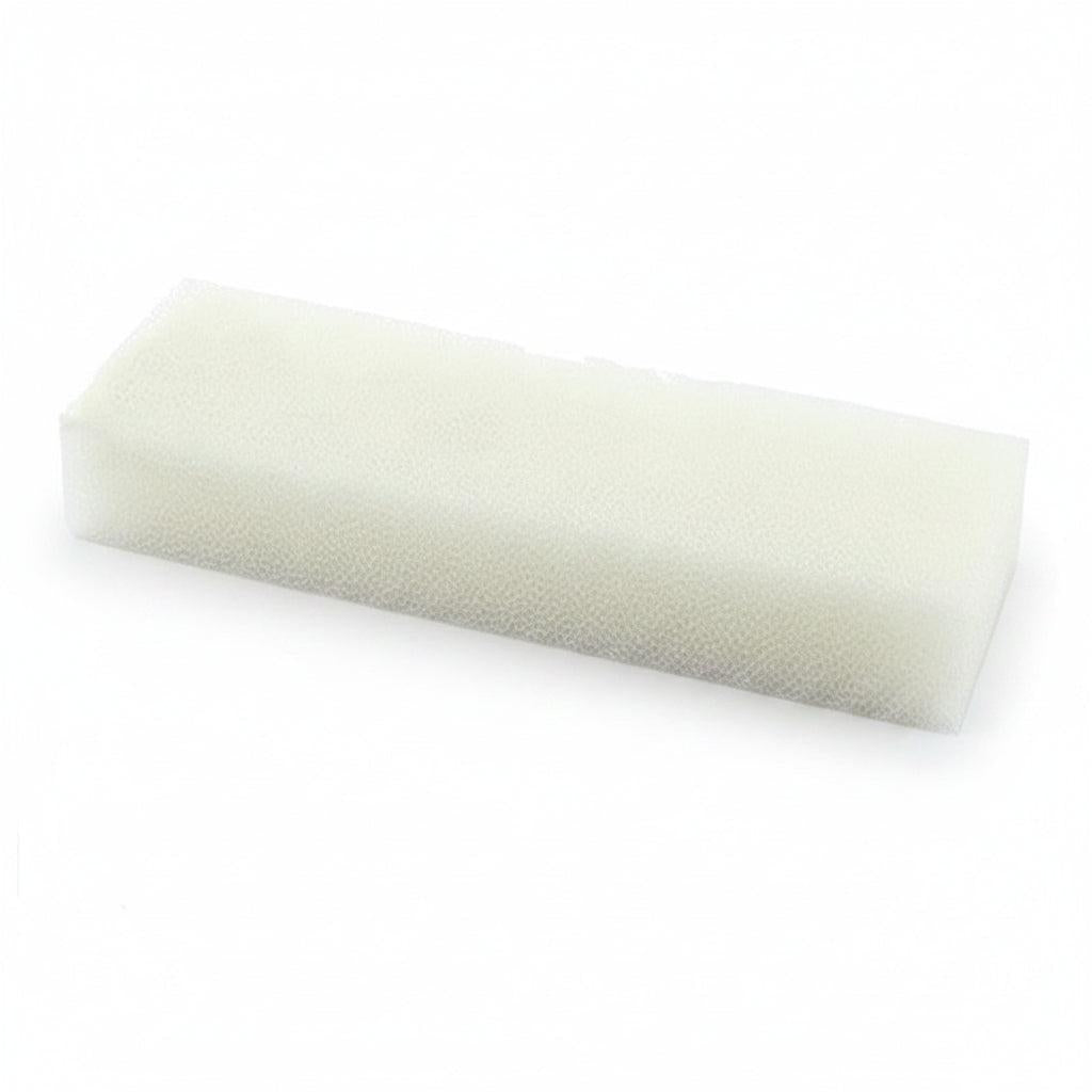 A rectangular white askoll filter foam block with a textured, porous surface, shown on a plain white background.
