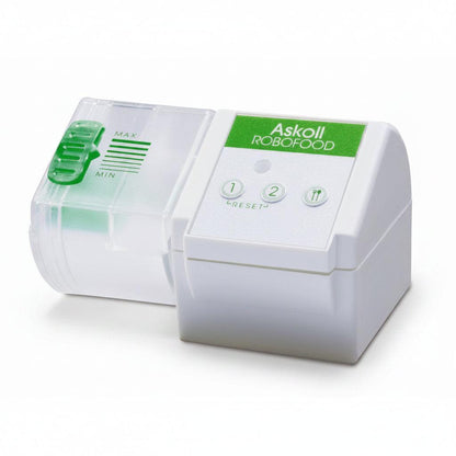 Askoll Robofood robotic food dispenser in white and green, featuring a clear plastic hopper with green level markings and three control buttons on the front panel.
