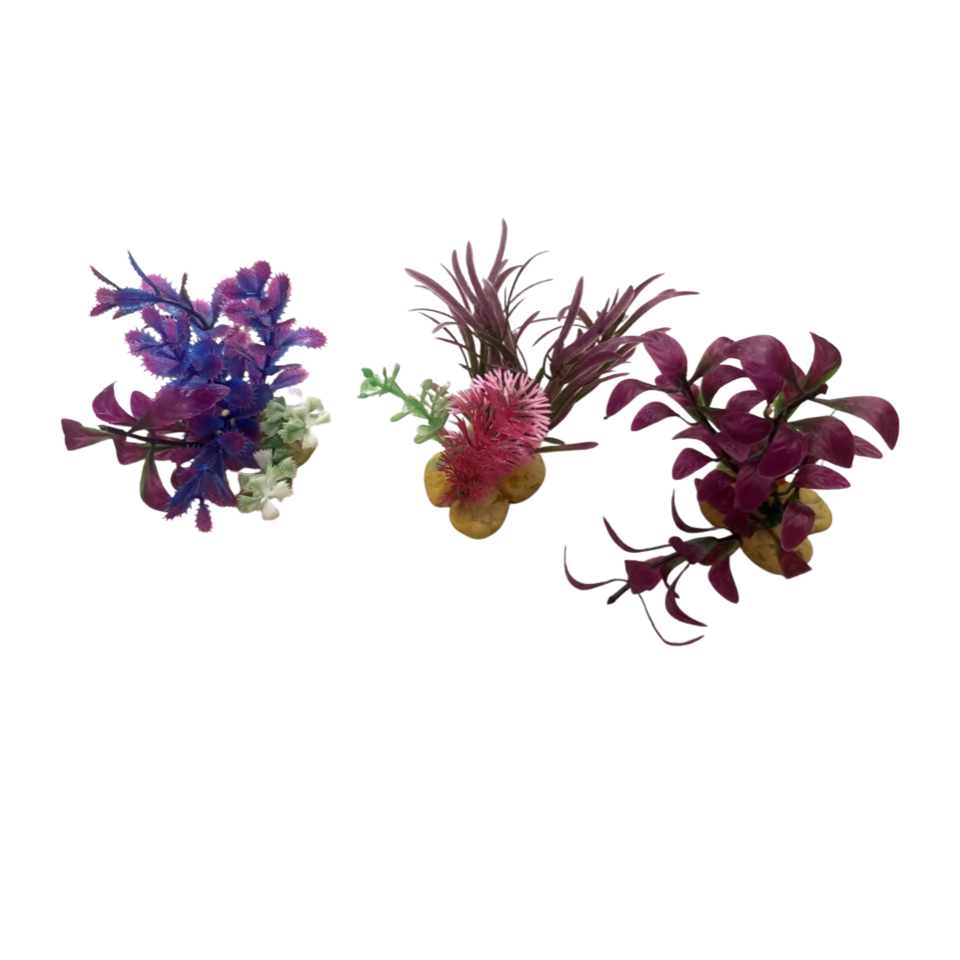 Three artificial floral clusters with purple, pink, blue, green, and yellow tones on a plain white background.