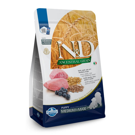 2.5kg bag of Farmina N&D Ancestral Grain puppy food with lamb, blueberry, and grain imagery on white packaging.