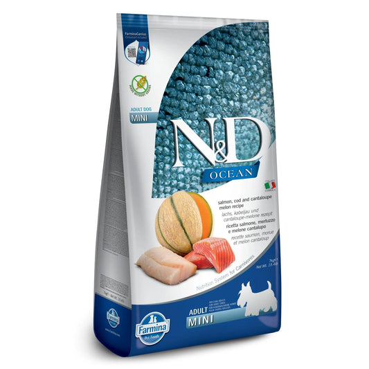 7kg bag of Farmina N&D Ocean Adult Mini salmon, cod, and cantaloupe dog food with blue and white branding.