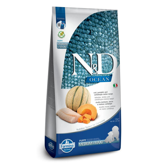 12kg bag of Farmina N&D Ocean Puppy Medium/Maxi dog food featuring cod, pumpkin, and cantaloupe imagery.