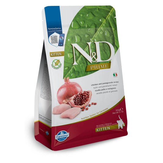 300g bag of N&D Prime Kitten chicken and pomegranate dry cat food with a green leaf and red pomegranate design.
