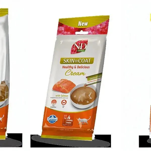 N&D Quinoa Skin & Coat salmon cream cat treat pouch, 60g pack featuring salmon imagery and orange branding.