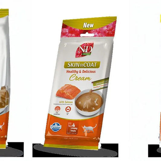 N&D Quinoa Skin & Coat salmon cream cat treat pouch, 60g pack featuring salmon imagery and orange branding.