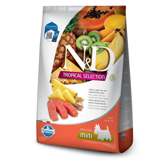 5kg bag of N&D Tropical Selection Adult Mini dog food featuring salmon, ancestral grains, and tropical fruit imagery.