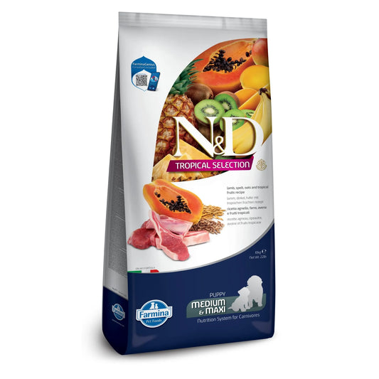 10kg bag of Farmina N&D Tropical Selection puppy food featuring lamb, ancestral grains, and colorful tropical fruits.