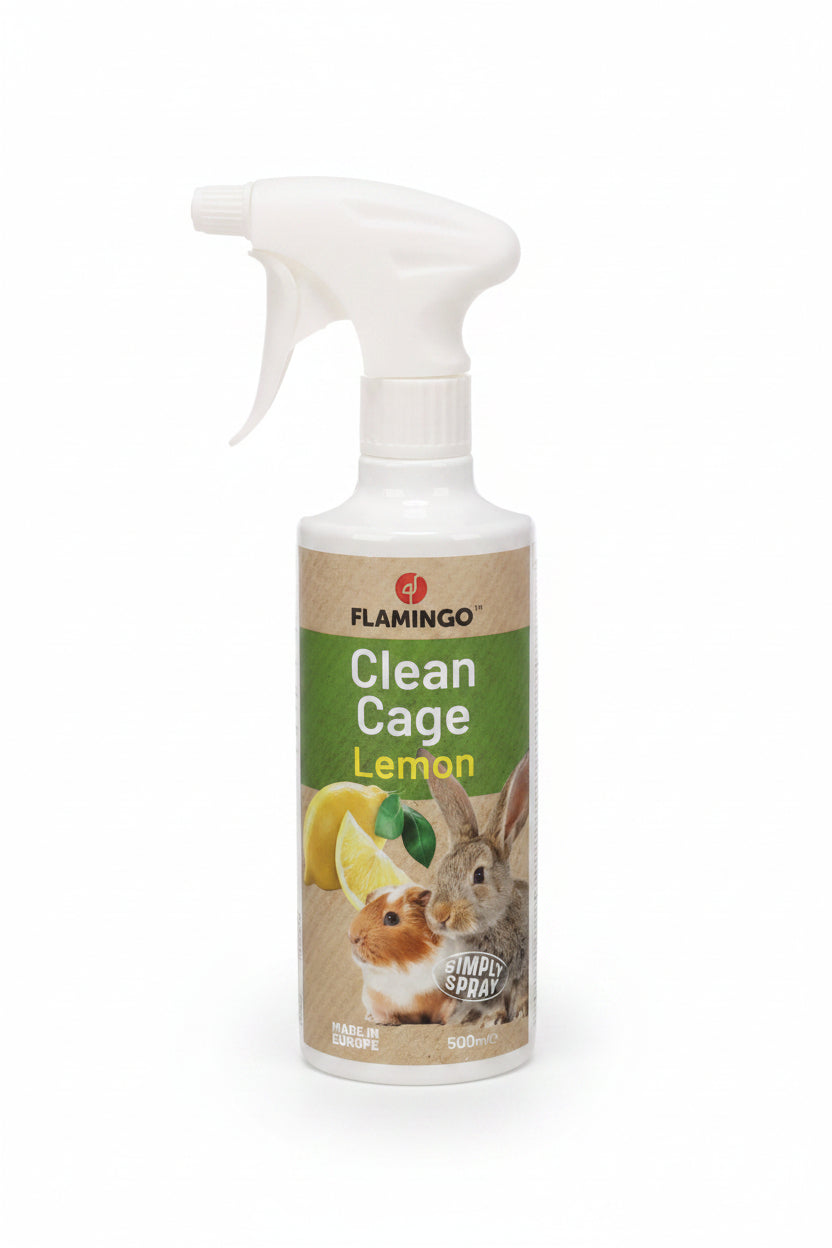 A white plastic trigger spray bottle of Flamingo Clean Cage Lemon pet cleaner, featuring a label with a rabbit, a guinea pig, and lemon illustrations.