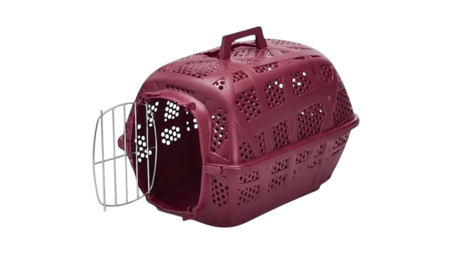 A burgundy plastic pet carrier with a hinged wire door, shown on a plain white background.