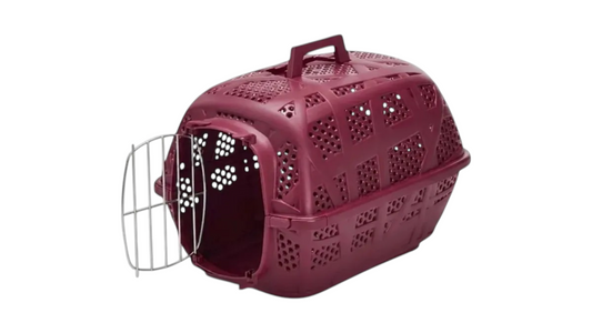 A burgundy plastic pet carrier with a hinged wire door, shown on a plain white background.