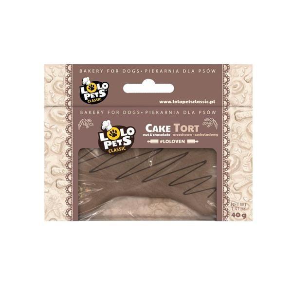 A packaged dog treat cake shaped like a tortilla chip, sealed in a clear plastic window package with a brown and beige label. The brand Lolo Pets Classic is clearly visible on the front.