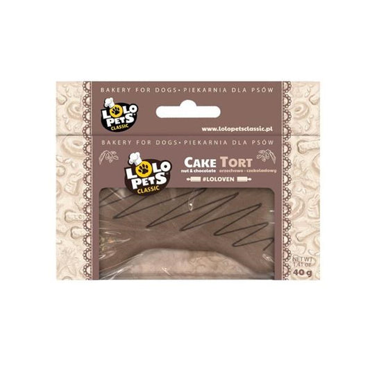 A packaged dog treat cake shaped like a tortilla chip, sealed in a clear plastic window package with a brown and beige label. The brand Lolo Pets Classic is clearly visible on the front.