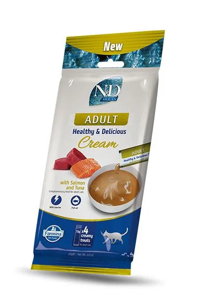 N&D Ocean Salmon and Tuna cream cat treat pouch, 60g pack featuring images of fresh fish and creamy cat food.