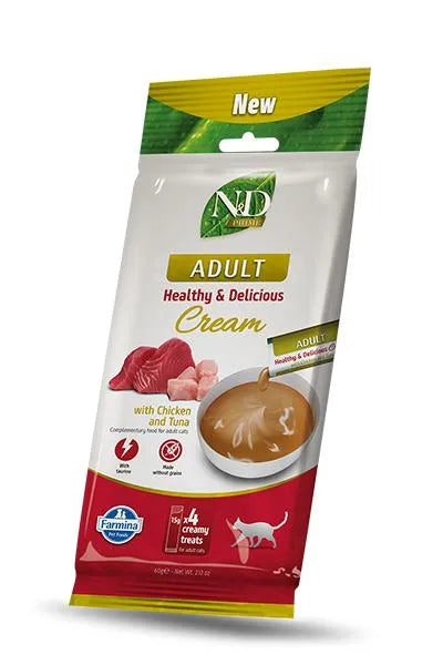 N&D Prime Chicken and Tuna creamy cat treat pouch, 60g pack featuring images of fresh meat and a bowl of cat cream.