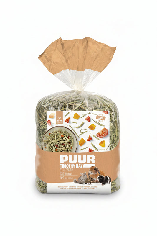 A bag of PUUR Timothy Hay for small animals, featuring green and yellow dried hay inside a clear plastic bag with a brown paper collar and a brown label, shown on a white background.