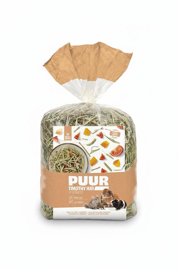 A bag of PUUR Timothy Hay for small animals, featuring green and yellow dried hay inside a clear plastic bag with a brown paper collar and a brown label, shown on a white background.