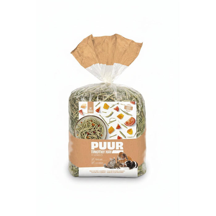 A bag of PUUR Timothy Hay for small animals, featuring green and yellow dried hay inside a clear plastic bag with a brown paper collar and a brown label, shown on a white background.