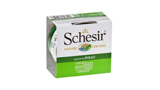 A pack of Schesir Nature for Dog chicken filletts in a white and green cardboard box, shown on a plain white background.