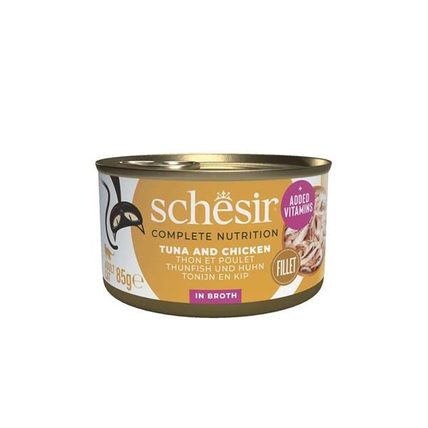 A can of Schäsir Complete Nutrition Tuna and Chicken fillet wet cat food in broth, featuring a gold and white label with purple accents, on a plain white background.