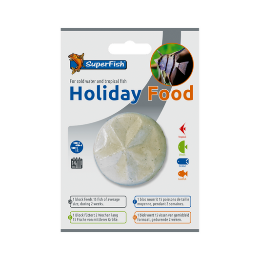 SuperFish Holiday Food for cold water and tropical fish, in its original retail packaging with a clear plastic disc showing the sandy white food inside.