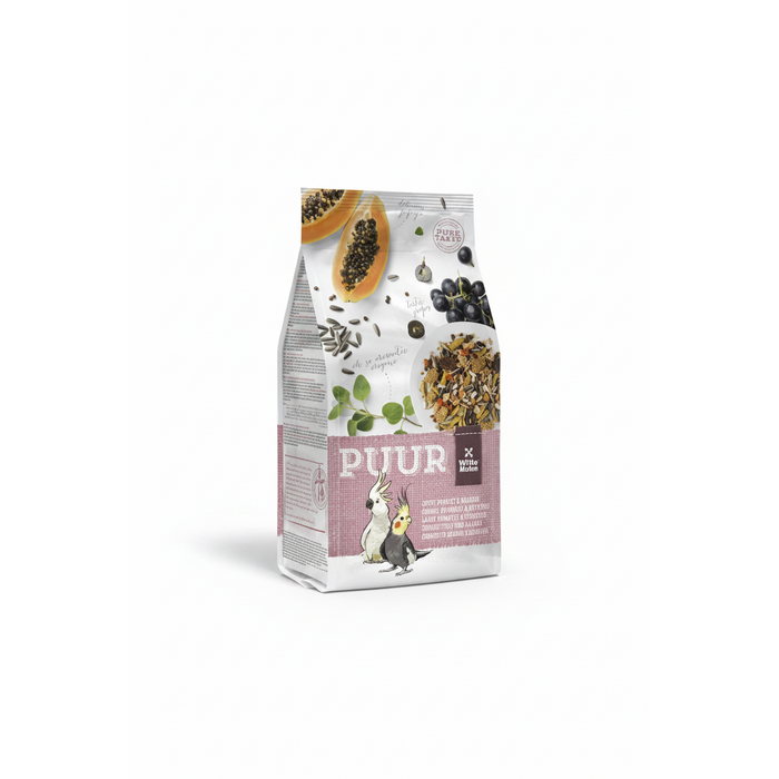 A bag of Puiur bird food, specifically Puur for cockatoos and parakeets, featuring a white and pink design with illustrations of, a grey parrot, and cockatiel with food ingredients like papaya and seeds.