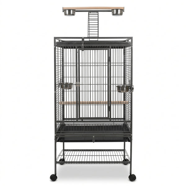A large black metal bird cage with a rolling wheeled frame, featuring multiple perches, two hanging bowls, and a wooden top bar with metal perches, shown against a plain white background.